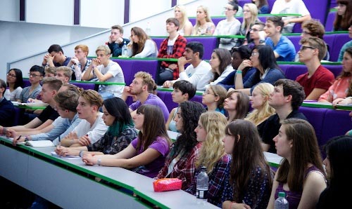 Students sat in a full lecture hall