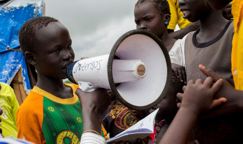Child speaking through a megaphone